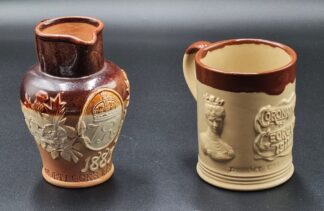 LOT 155 (32907) Est R300 to R600 - A Doulton Lambeth Stoneware Queen Victoria 1887 Golden Jubilee (Mortlock's Jubilee Jug)