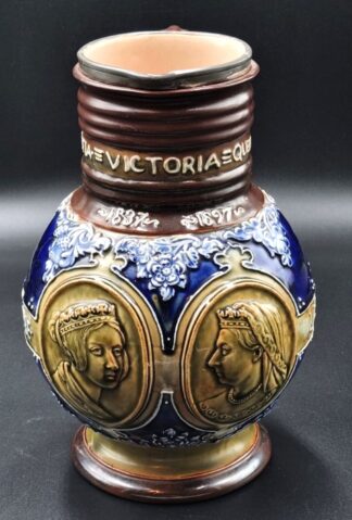 LOT 156 (32907) Est R500 to R1500 - A Late Victorian Doulton Lambeth Stoneware Commemorative Queen Victoria 1837-1897 Diamond Jubilee footed Jug