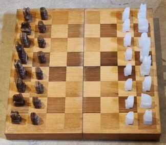 LOT 203 (32569) Est R1000 to R3000 - A Mid 20th Century Mahogany and Veneer Folding Mexican Chess Board and  Handmade Semi-precious Stone Chess Pieces
