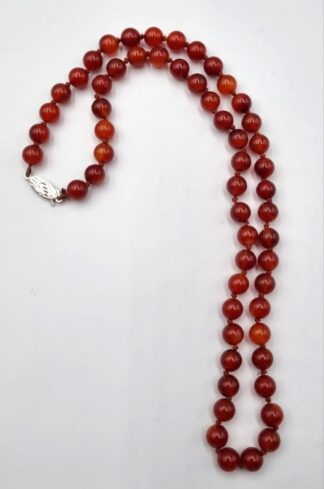 LOT 232 (32914) Est R500 to R1500 - A String of Carnelian Beads