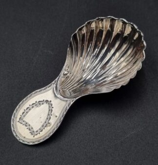 LOT 9 (32911) Est R500 to R1500 - A George III Silver Bright-cut Engraved pattern Caddy Spoon
