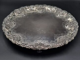 LOT 31 (32914) Est R25000 to R40000 - A Late 19th Century - Early 20th Century Portuguese Silver Rococo-style footed Salver