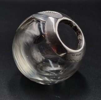 LOT 34 (3289410) Est R500 to R1500 - An Edward VII Gentleman's Clear Glass Orb-shaped Smoking Companion with Silver Mount Recesses