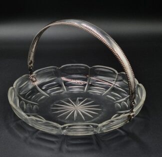 LOT 36 (32843) Est R1000 to R3000 - An Early 20th Century Dutch Cut Glass Cake Basket fitted with a Silver mount Bead pattern Swing-handle