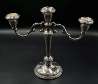 LOT 40 (33003) Est R5000 to R15000 - A Pair of Mid 20th Century American  Hollow-cast Weighted Reinforced Sterling Silver Grande Baroque pattern Footed Three Light Table Candelabras