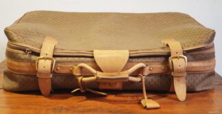 LOT 305 (31863158) Est R3000 to R6000 - A Vintage Italian Gucci Canvas and Light Tan Leather Soft Sided Suitcase circa 1970s