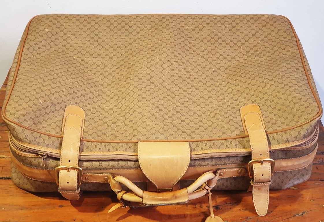 LOT 305 (31863158) Est R3000 to R6000 – A Vintage Italian Gucci Canvas and Light Tan Leather Soft Sided Suitcase circa 1970s - Image 2