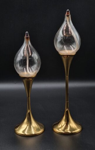 LOT 332 () Est R1000 to R3000 - A Rare graduated pair of West German Space Age footed Clear Drops Brass Mount Oil Lamps (Ollampen) circa 1970s