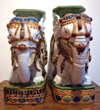 LOT 340 (33016) Est R3000 to R6000 - A Matched Graduated Pair of a Ceramic Orientalist Figural Elephant Vase Stands