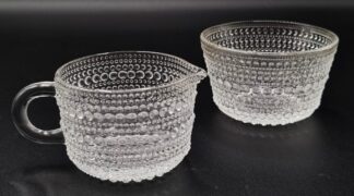 LOT 70 (33032) Est R400 to R800 - A Finnish Arabia Nuutajärvi Kastehelmi Clear (Dewdrop) Milk jug and Sugar Bowl circa 1970s