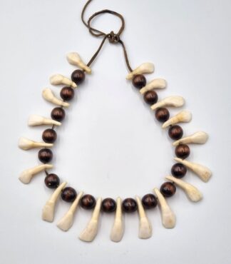 LOT 375 (33032) Est R500 to R1500 - An Unusual Bedouin Camel Tooth and Stained Palmwood Bead Necklace