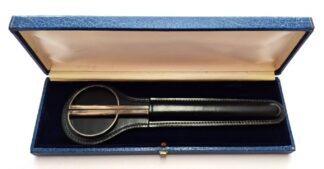 LOT 215 (32582) Est R500 to R1500 - A Commemorative Pair of Silver mount inauguration Scissors featuring Engine-turned decoration with open looped handles