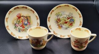 LOT 125 (32925) Est R300 to R600 - 2 x Mid 20th Century Royal Doulton Bunnykins Nurseryware Teacups and Saucers