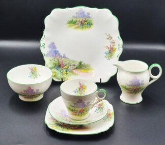 LOT 131 (32935) Est R500 to R1500 - 5 x Bell China Meadowside pattern Tea Trios circa 1930s