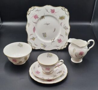 LOT 157 (33048) Est R500 to R1500 - 8 x Post-war Tuscan Fine Bone China Windswept pattern Tea Trios