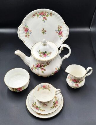 LOT 108 (329) Est R3000 to R6000 - 12 x Royal Albert Moss Rose pattern Tea trios