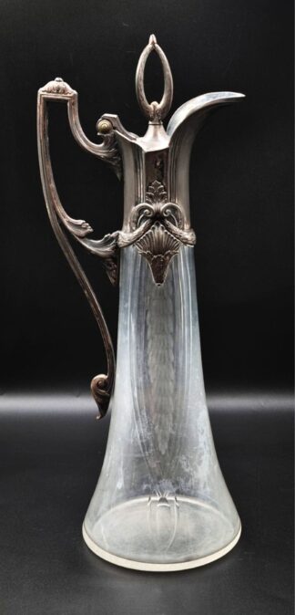 LOT 47 (329204) Est R1000 to R3000 - An Early 20th Century German WMF Oxidised Electroplated White Metal mount and Cut Glass Neoclassical-Revival Claret Jug