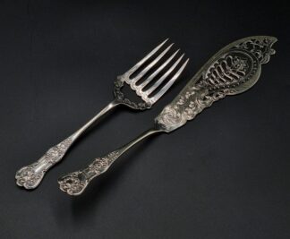 LOT 49 (32147) Est R300 to R600 - A Pair of mid-Victorian Queen's pattern EPNS Fish Servers