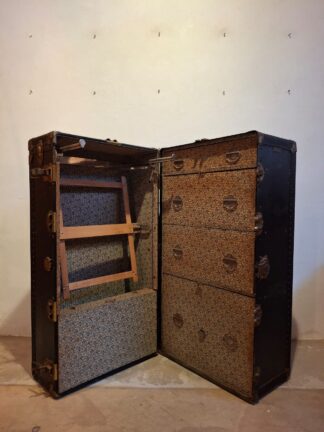 LOT 304 (33032) Est R3000 to R6000 - An Early 20th Century American Canvas Wrapped and Vulcanized Fibre Bound Ladies Transatlantic Travel Ship Steamer Wardrobe Trunk