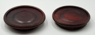 LOT 199 (10000) Est R300 to R600 - A Graduated Pair of Vintage Oriental Rosewood Vase Stands