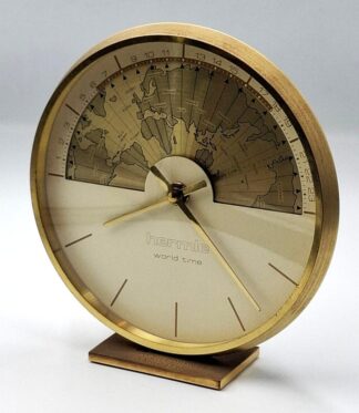 LOT 211 (32945) Est R800 to R1600 - A Late 20th Century German Manufactured Battery Operated Hermle World Time Presentation Desk Clock of Modernist Design