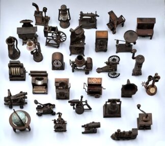 LOT 213 (33097) Est R1000 to R3000 - A Collection of  31 x Cabinet Collectable Cast Metal and Composite  Play Me Sharpener Miniatures