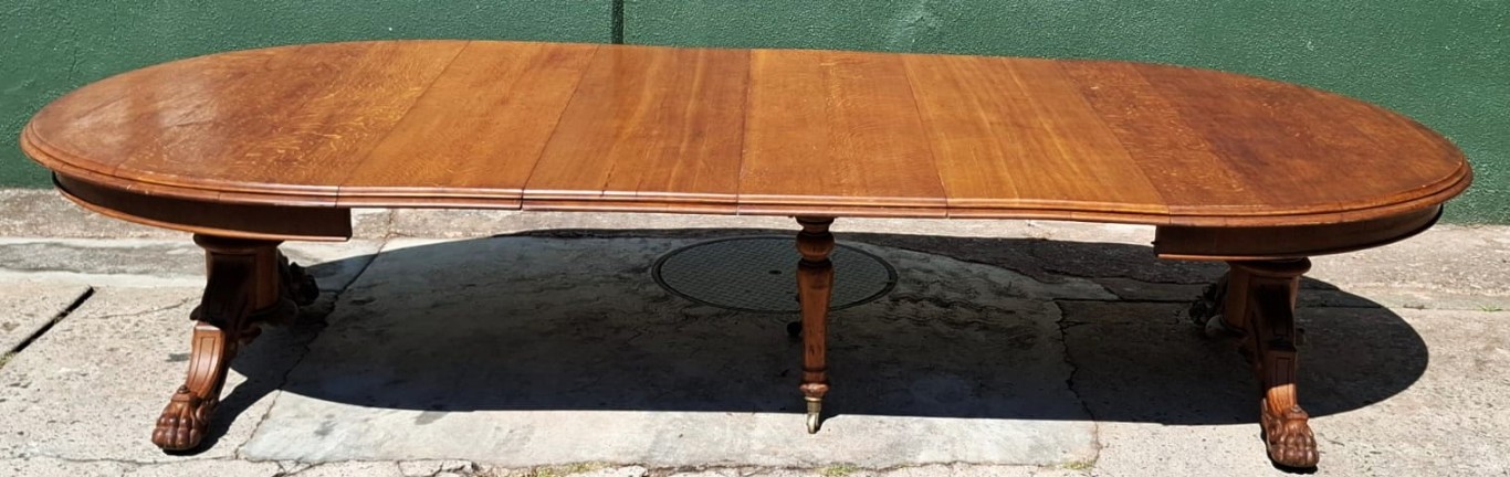 LOT 221 (33110) Est R10000 to R30000 – A Magnificent and Imposing Mid-Victorian Oakwood and Veneer Renaissance-Revival Extendable Dining Table with Dual Crank Wound Mechanism circa 1870
