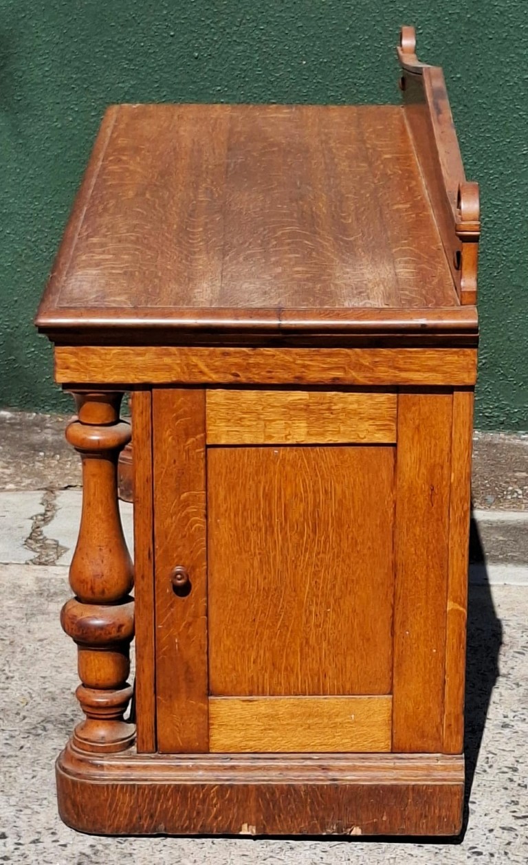 LOT 221 (33110) Est R10000 to R30000 – A Magnificent and Imposing Mid-Victorian Oakwood and Veneer Renaissance-Revival Extendable Dining Table with Dual Crank Wound Mechanism circa 1870 - Image 10