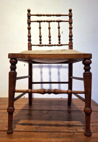 LOT 227 (33110) Est R500 to R1500 - An Edwardian Colonial Fruitwood Child's Spindle-turned Side Chair