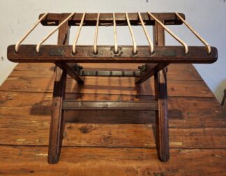 LOT 229 (33110) Est R500 to R1500 - A 19th Century Folding Teakwood Voortrekker's Trekstoel/Stool