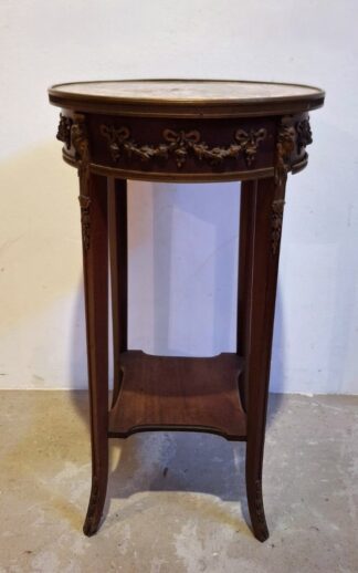 LOT 215 (33091) Est R3000 to R6000 - An Early 20th Century French Walnut Louis XVI-style Two Tier Gueridon (guéridon à deux plateaux) fitted with gilt metal mounts