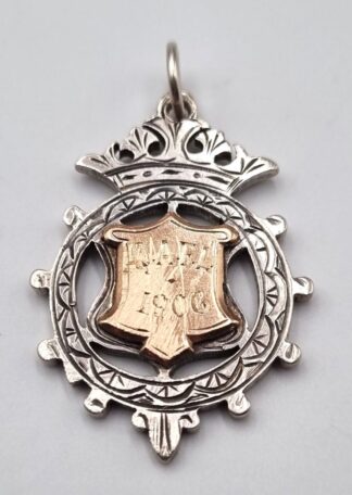 LOT 330 (32914) Est R500 to R1500 - An Edward VII Silver and 9ct Strawberry Gold Mount Gentleman's Fob Medal