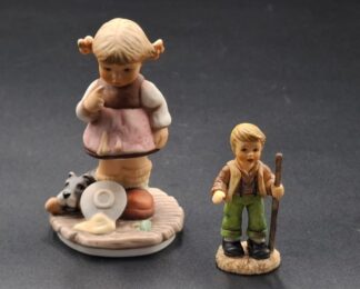 LOT 105 (329359/43) Est R100 to R300 - A Late 20th Century Berta Hummel Goebel bisque porcelain figurine, Oops!