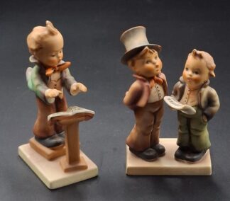 LOT 109 (3293513/43) Est R300 to R600 - A West German  M.I. Hummel porcelain figure group, Band Leader (Dirigent)