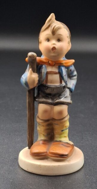 LOT 121 (3293525/43) Est R300 to R600 - A Post-war West German  M.I. Hummel porcelain figurine, Wandering Boy/Little Hiker (Wanderbursch) (Miniature version)
