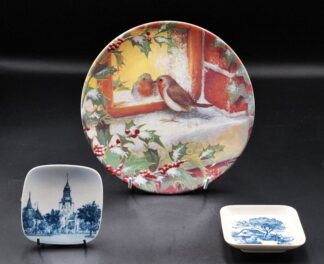 LOT 143 (32950) Est R100 to R300 - A Coalport Winter Reflection wall-plate designed by Barbara Mitchell