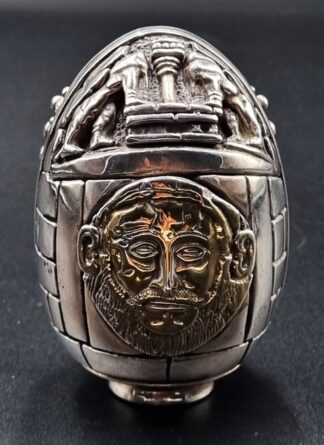 LOT 8 (32947) Est R500 to R1500 - A Late 20th Century Grecian Silver and Silver Gilt Overlaid Mycenae Souvenir Egg Ornament/Paperweight