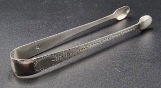 LOT 10 (32945) Est R500 to R1500 - A Pair of George III Silver Classical-Style Sugar Tongs