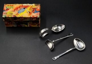 LOT 21 (32945) Est R1000 to R3000 - A George VI Silver 2-piece Chevron pattern Art Deco-style Baby's Feeding Set