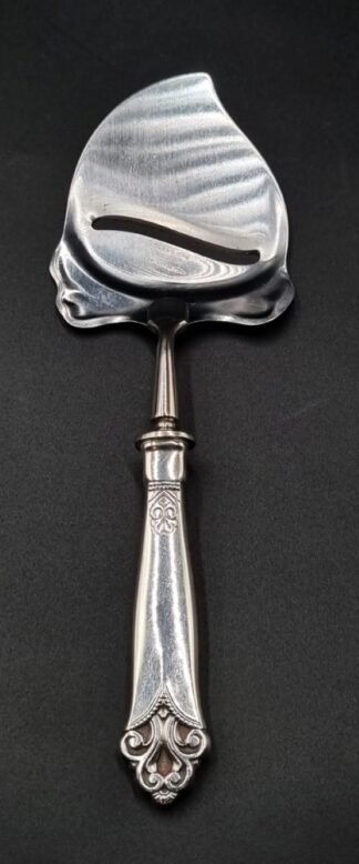 LOT 22 (32945) Est R500 to R1500 - A Mid 20th Century Norwegian Silver Hafted Cheese Plane (ostehøvel)