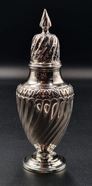 LOT 27 (32951) Est R2000 to R4000 - A Late Victorian Silver footed Georgian-style Sugar Dredger/Caster with detachable domed, finialled and pierced cover