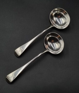 LOT 36 (329543) Est R2000 to R4000 - A Pair of Early Victorian Silver Old English pattern Sauce Ladles
