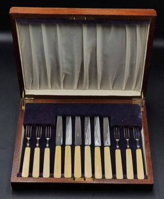 LOT 87 (33119) Est R500 to R1500 - An Early 20th Century English EPNS and Bone Hafted Fruit Service for Twelve of Plain Design