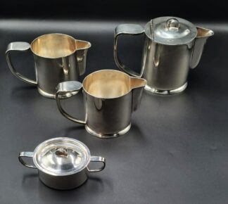LOT 92 (33065) Est R500 to R1500 - A Collection of Mid 20th Century Art Deco-style Swiss-made Cast Stainless Steel Hotelware (10pcs)