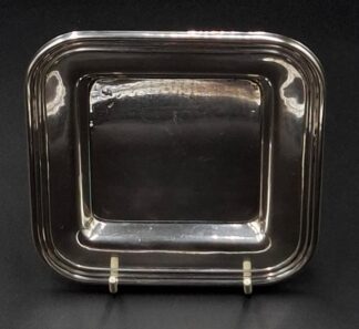 LOT 57 (33113) Est R1200 to R2000 - An Italian Silver Butter Coaster