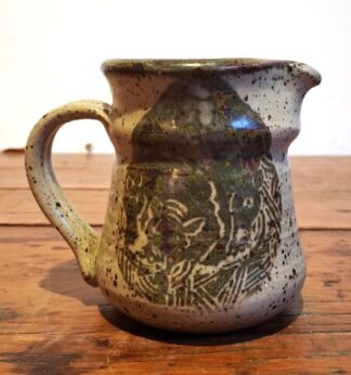 LOT 319 (32981) Est R100 to R300 - A Rorke's Drift Glazed Stoneware Jug