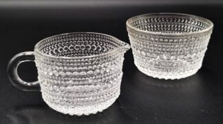 LOT 112 (33032) Est R300 to R600 - A Finnish Arabia Nuutajärvi Kastehelmi Clear (Dewdrop) Milk jug and Sugar Bowl circa 1970s