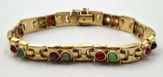 LOT 230 (3295179) Est R30000 to R60000 - A Ladies 18ct Yellow Gold Robot Cabochon Articulated Link Bracelet