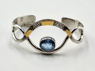 LOT 290 (329863) Est R800 to R1600 - An Avant-garde Sterling Silver and Silver Gilt embellished Loop Bangle, attributed to Stephen Colgate (English born 1947 - )