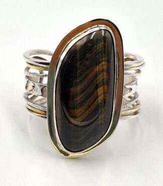 LOT 288 (329861) Est R1700 to R3000 - A Ladies Two-tone Sterling Silver and Silver Gilt Tiger's Eye bangle circa 1970s-1980s